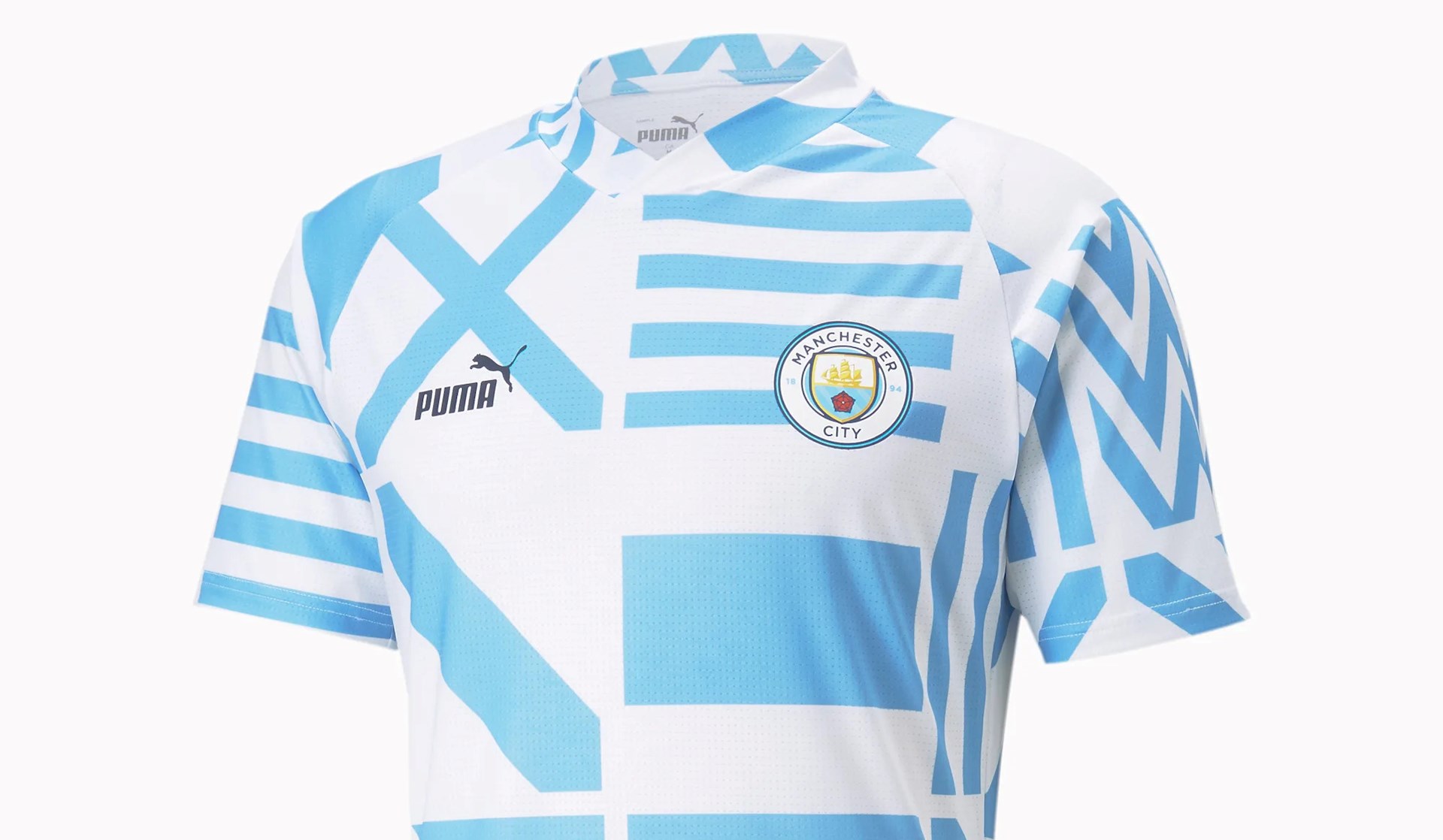 manchester-city-warming-up-shirt-22-23.jpg